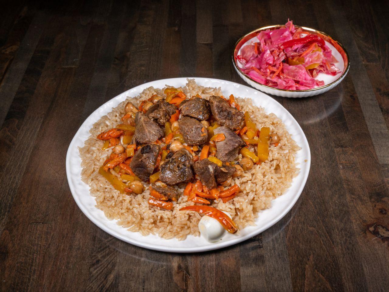 Bukharian Plov — slow-cooked halal rice with beef carrots and chickpeas at Perfect Together Philadelphia