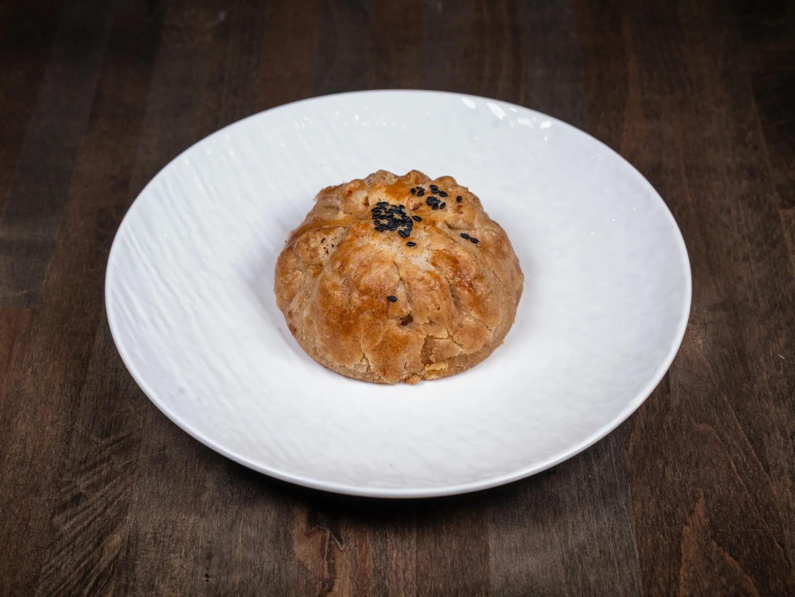Samsa — traditional Uzbek baked pastry with black sesame seeds at Perfect Together Philadelphia